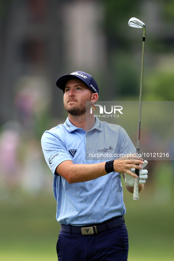 Patrick Rodgers of Jupiter, Florida hits from the 18th fairway during The Memorial Tournament presented by Workday at Muirfield Village Golf...