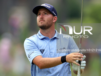 Patrick Rodgers of Jupiter, Florida hits from the 18th fairway during The Memorial Tournament presented by Workday at Muirfield Village Golf...