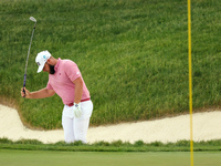 Tyrrell Hatton of High Wycombe, England reacts to his shot from the bunker on the 18th green during The Memorial Tournament presented by Wor...