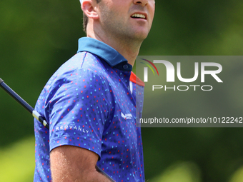 Denny McCarthy of Jupiter, Florida looks down the fairway from the 18th tee during The Memorial Tournament presented by Workday at Muirfield...