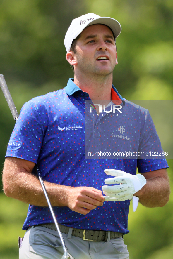 Denny McCarthy of Jupiter, Florida looks down the fairway at the 18th tee during The Memorial Tournament presented by Workday at Muirfield V...