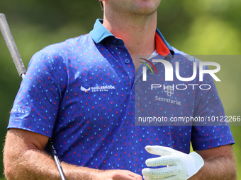 Denny McCarthy of Jupiter, Florida looks down the fairway at the 18th tee during The Memorial Tournament presented by Workday at Muirfield V...