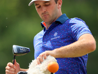 Denny McCarthy of Jupiter, Florida pulls out his club at the 18th tee during The Memorial Tournament presented by Workday at Muirfield Villa...