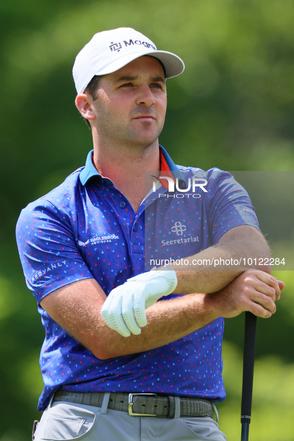 Denny McCarthy of Jupiter, Florida looks down the fairway at the 18th tee during The Memorial Tournament presented by Workday at Muirfield V...