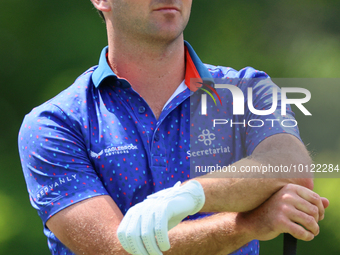 Denny McCarthy of Jupiter, Florida looks down the fairway at the 18th tee during The Memorial Tournament presented by Workday at Muirfield V...