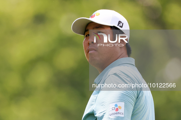 Byeong Hun An of South Korea looks down the fairway from the 18h tee during The Memorial Tournament presented by Workday at Muirfield Villag...