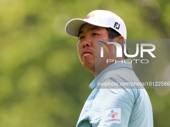 Byeong Hun An of South Korea looks down the fairway from the 18h tee during The Memorial Tournament presented by Workday at Muirfield Villag...