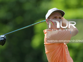 Sam Stevens of Wichita, Kansas hits from the 18th tee during The Memorial Tournament presented by Workday at Muirfield Village Golf Club in...