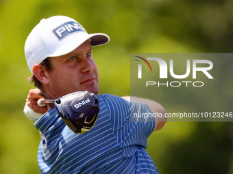 Harris English of Sea Island, Georgia hits from the 18th tee during The Memorial Tournament presented by Workday at Muirfield Village Golf C...