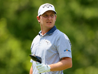 Emiliano Grillo of Argentina follows his shot from the 18th tee during The Memorial Tournament presented by Workday at Muirfield Village Gol...