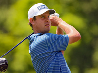 Harris English of Sea Island, Georgia hits from the 18th tee during The Memorial Tournament presented by Workday at Muirfield Village Golf C...