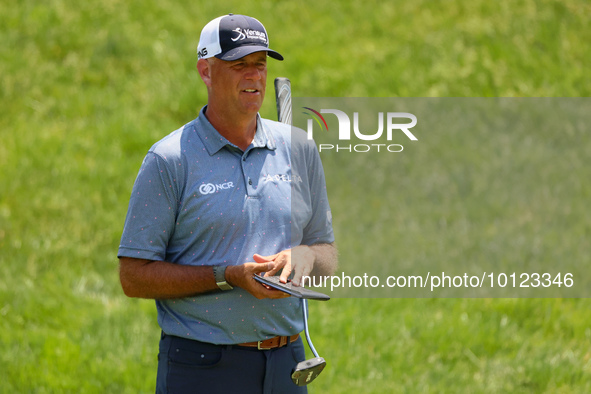 Stewart Cink of Atlanta, Georgia looks over the 17th green during The Memorial Tournament presented by Workday at Muirfield Village Golf Clu...