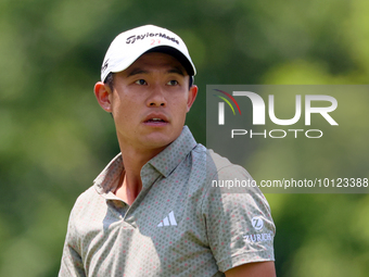 Collin Morikawa of La Canada, California follows his shot from the 18th tee during The Memorial Tournament presented by Workday at Muirfield...