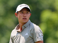 Collin Morikawa of La Canada, California follows his shot from the 18th tee during The Memorial Tournament presented by Workday at Muirfield...