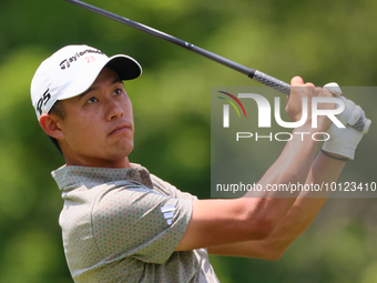 Collin Morikawa of La Canada, California follows his shot from the 18th tee during The Memorial Tournament presented by Workday at Muirfield...