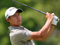 Collin Morikawa of La Canada, California follows his shot from the 18th tee during The Memorial Tournament presented by Workday at Muirfield...