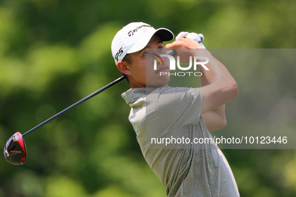 Collin Morikawa of La Canada, California follows his shot from the 18th tee during The Memorial Tournament presented by Workday at Muirfield...