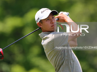 Collin Morikawa of La Canada, California follows his shot from the 18th tee during The Memorial Tournament presented by Workday at Muirfield...