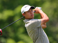 Collin Morikawa of La Canada, California follows his shot from the 18th tee during The Memorial Tournament presented by Workday at Muirfield...