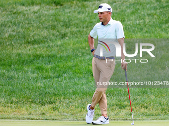 Eric Cole of Delray Beach, Florida waits on the 17th green during The Memorial Tournament presented by Workday at Muirfield Village Golf Clu...