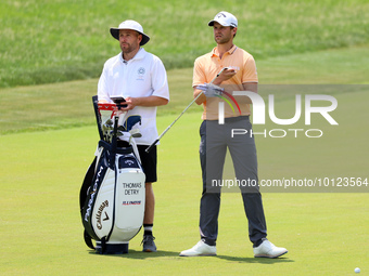 Thomas Detry of Brussels, Belgium takes his club on the 17th fairway during The Memorial Tournament presented by Workday at Muirfield Villag...