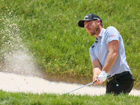 Danny Willett of Sheffield, England hits from the bunker on the 17th green during The Memorial Tournament presented by Workday at Muirfield...