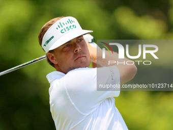 Keith Mitchell  of St. Simons Island, Georgia hits from the 18th tee during The Memorial Tournament presented by Workday at Muirfield Villag...