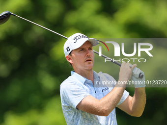 Russell Henley of Columbus, Georgia hits from the 18th tee during The Memorial Tournament presented by Workday at Muirfield Village Golf Clu...