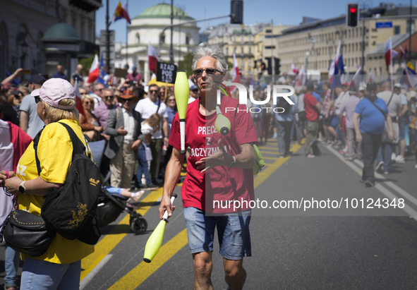 People are seen taking part in a march for unity in Warsaw, Poland on 04 June, 2023. Participants from across the country have come to Warsa...