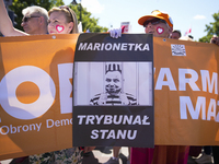 People are seen taking part in a march for unity in Warsaw, Poland on 04 June, 2023. Participants from across the country have come to Warsa...