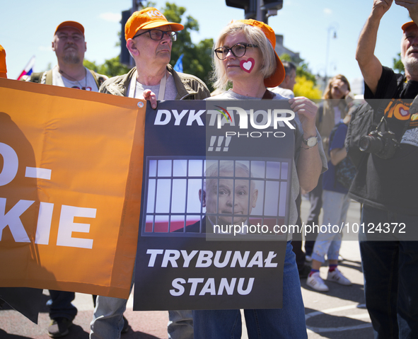 People are seen taking part in a march for unity in Warsaw, Poland on 04 June, 2023. Participants from across the country have come to Warsa...