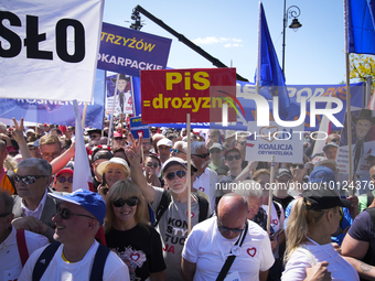 People are seen taking part in a march for unity in Warsaw, Poland on 04 June, 2023. Participants from across the country have come to Warsa...