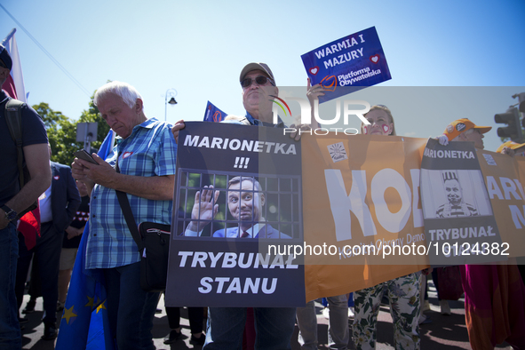 People are seen taking part in a march for unity in Warsaw, Poland on 04 June, 2023. Participants from across the country have come to Warsa...