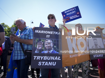 People are seen taking part in a march for unity in Warsaw, Poland on 04 June, 2023. Participants from across the country have come to Warsa...