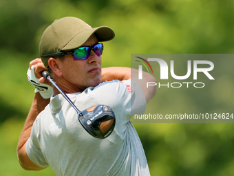 Adam Scott of Gold Coast, Queensland, Australia hits from the 18th tee during The Memorial Tournament presented by Workday at Muirfield Vill...