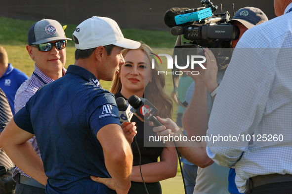 Viktor Hovland of Oslo, Norway is interviewed after winning in a playoff against Denny McCarthy of Jupiter, Florida during the final round o...