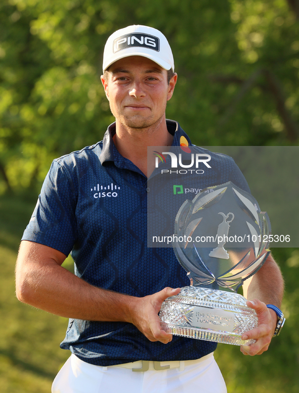 Viktor Hovland of Oslo, Norway holds the winner’s trophy after winning his first tournament in the United States in a playoff against Denny...