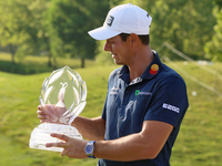 Viktor Hovland of Oslo, Norway holds the winner’s trophy after winning his first tournament in the United States in a playoff against Denny...