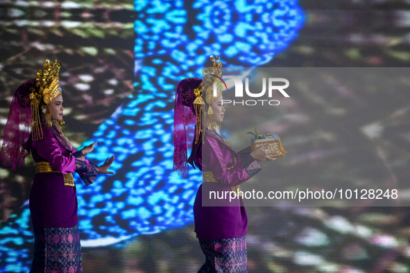 Dancers performing the art of Offering Dance, Batam, Riau Islands. The Offering Dance is a traditional Malay dance that is used to welcome g...