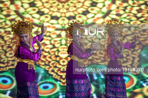 Dancers performing the art of Offering Dance, Batam, Riau Islands. The Offering Dance is a traditional Malay dance that is used to welcome g...