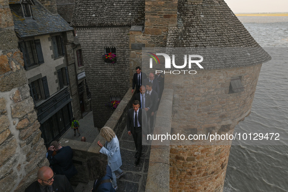 MONT-SAINT-MICHEL, FRANCE - JUNE 05, 2023:   
French President Emmanuel Macron and First Lady Brigitte Macron during their visit to Mont Sai...