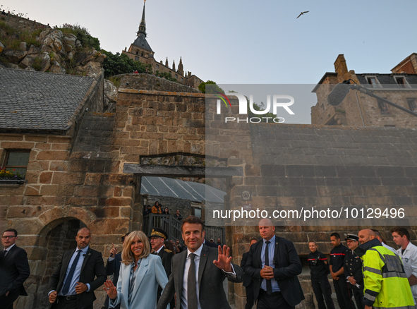 MONT-SAINT-MICHEL, FRANCE - JUNE 05, 2023:   
French President Emmanuel Macron and First Lady Brigitte Macron during their visit to Mont Sai...