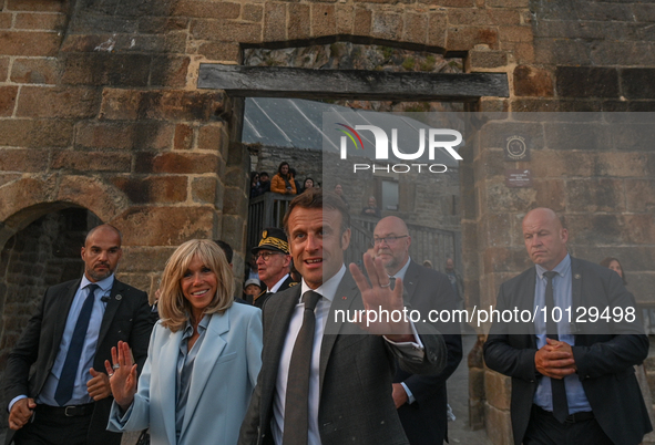 MONT-SAINT-MICHEL, FRANCE - JUNE 05, 2023:   
French President Emmanuel Macron and First Lady Brigitte Macron during their visit to Mont Sai...