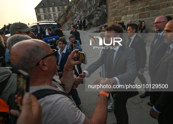 MONT-SAINT-MICHEL, FRANCE - JUNE 05, 2023:   
French President Emmanuel Macron and First Lady Brigitte Macron during their visit to Mont Sai...