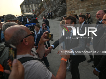 MONT-SAINT-MICHEL, FRANCE - JUNE 05, 2023:   
French President Emmanuel Macron and First Lady Brigitte Macron during their visit to Mont Sai...