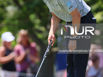 Jordan Spieth of Dallas, Texas lines up his putt on the 9th green during the final round of The Memorial Tournament presented by Workday at...