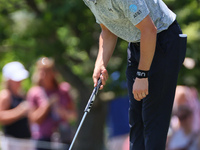 Jordan Spieth of Dallas, Texas lines up his putt on the 9th green during the final round of The Memorial Tournament presented by Workday at...