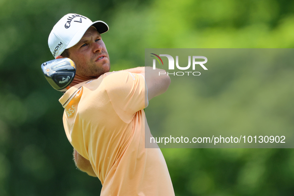 Thomas Detry of Brussels, Belgium hits from the 18th tee during The Memorial Tournament presented by Workday at Muirfield Village Golf Club...