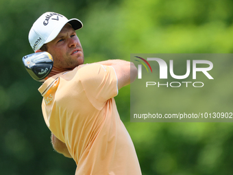 Thomas Detry of Brussels, Belgium hits from the 18th tee during The Memorial Tournament presented by Workday at Muirfield Village Golf Club...