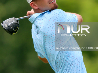 Sam Bennett of Madisonville, Texas hits from the 18th tee during The Memorial Tournament presented by Workday at Muirfield Village Golf Club...